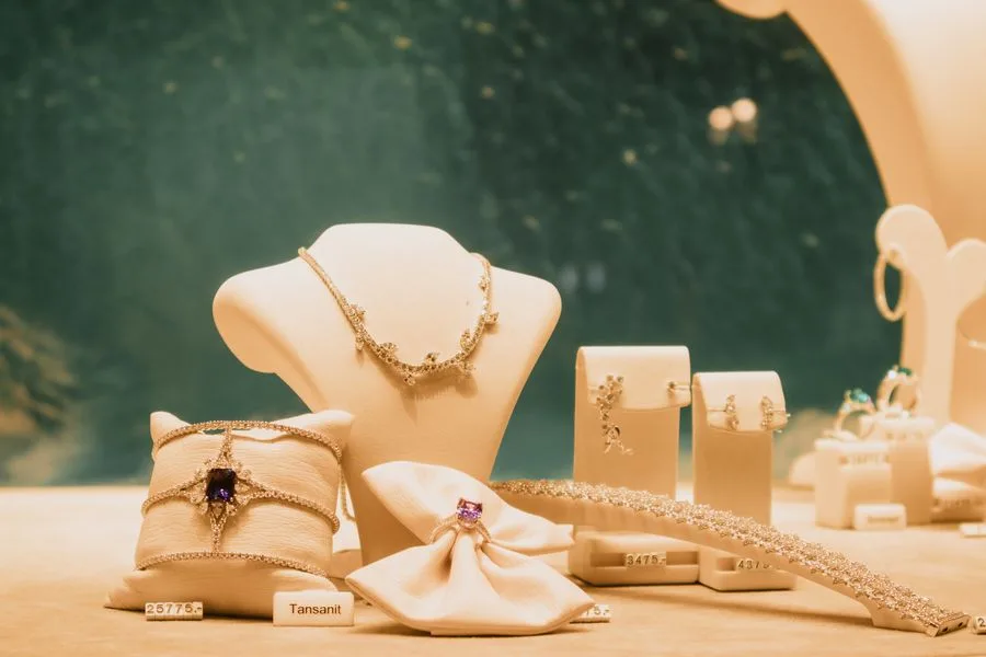 Jewelry displayed on stands in a boutique
